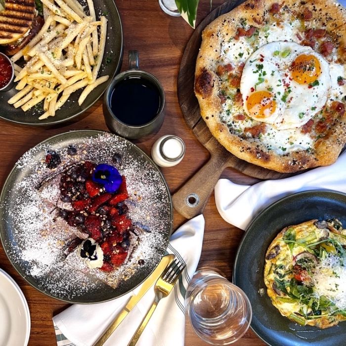 Table with pizza, frittata, crepe, and burger